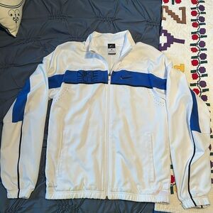 Nike White Jacket with Royal Blue Chest Stripe